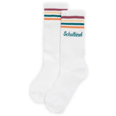 Ein Paar Loones Socken "Schulkind" petrol aus weicher Bio-Baumwolle mit bunten Streifen in Orange, Grün und Lila am Bund und grünem "Schulkind"-Schriftzug an der Seite - perfekt zum Schulanfang!.