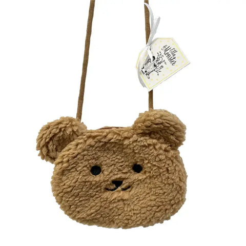 Die Tasche "Teddy" Kunstfell braun von Ella & Monster ist eine kleine, braune Kunstfellhandtasche in Form eines Bärengesichts mit runden Ohren - eine niedliche Teddy Handtasche Kinder Accessoire.
