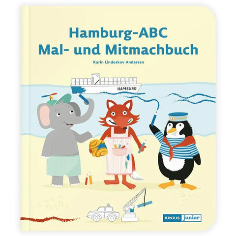 Umschlag des Mal- und Mitmachbuchs "Hamburg-ABC" von Karin Lindeskov Andersen (Junius Verlag): Zeichentrick-Elefant mit Schaufel, Fuchs mit Brezel, Pinguin mit Fernglas am Wasser mit Schiff und Flugzeugen. Für Kinder ab 2 Jahren!.