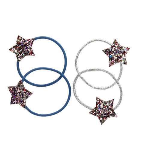Das Set "Glitzerstern" Haarbänder (4er Set) von Rex London - zwei blaue und zwei silberne mit funkelnden Stern-Dekoren, nebeneinander auf weißem Hintergrund. Perfekt als kleines Geschenk.